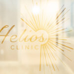 Helios clinic logo on glass